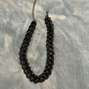 Leather and metal necklace. 16inch length